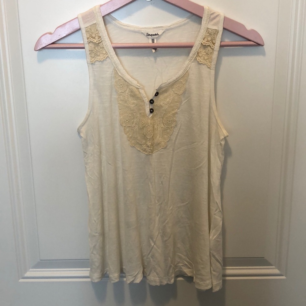 Ivory colored tank top with pretty lace details